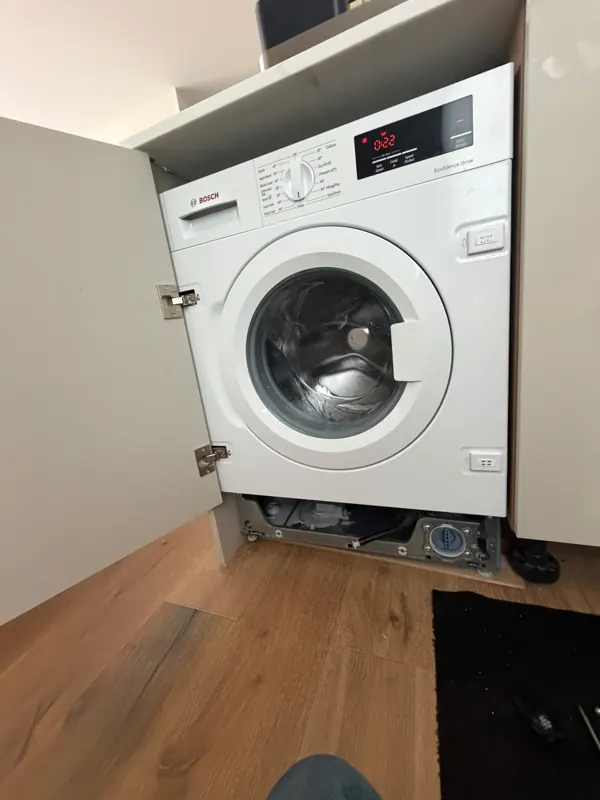 Integrated washing machine — LCDA repair visit
